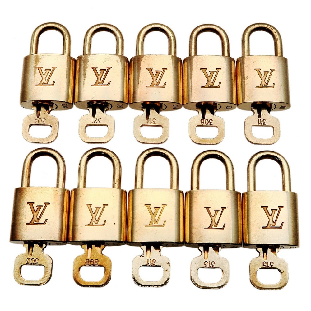 100% Auth Louis Vuitton 1 Lock and Key Like New